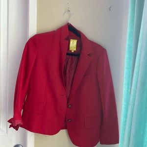 This is a Red Blazer from QMack it is in a size small in kids